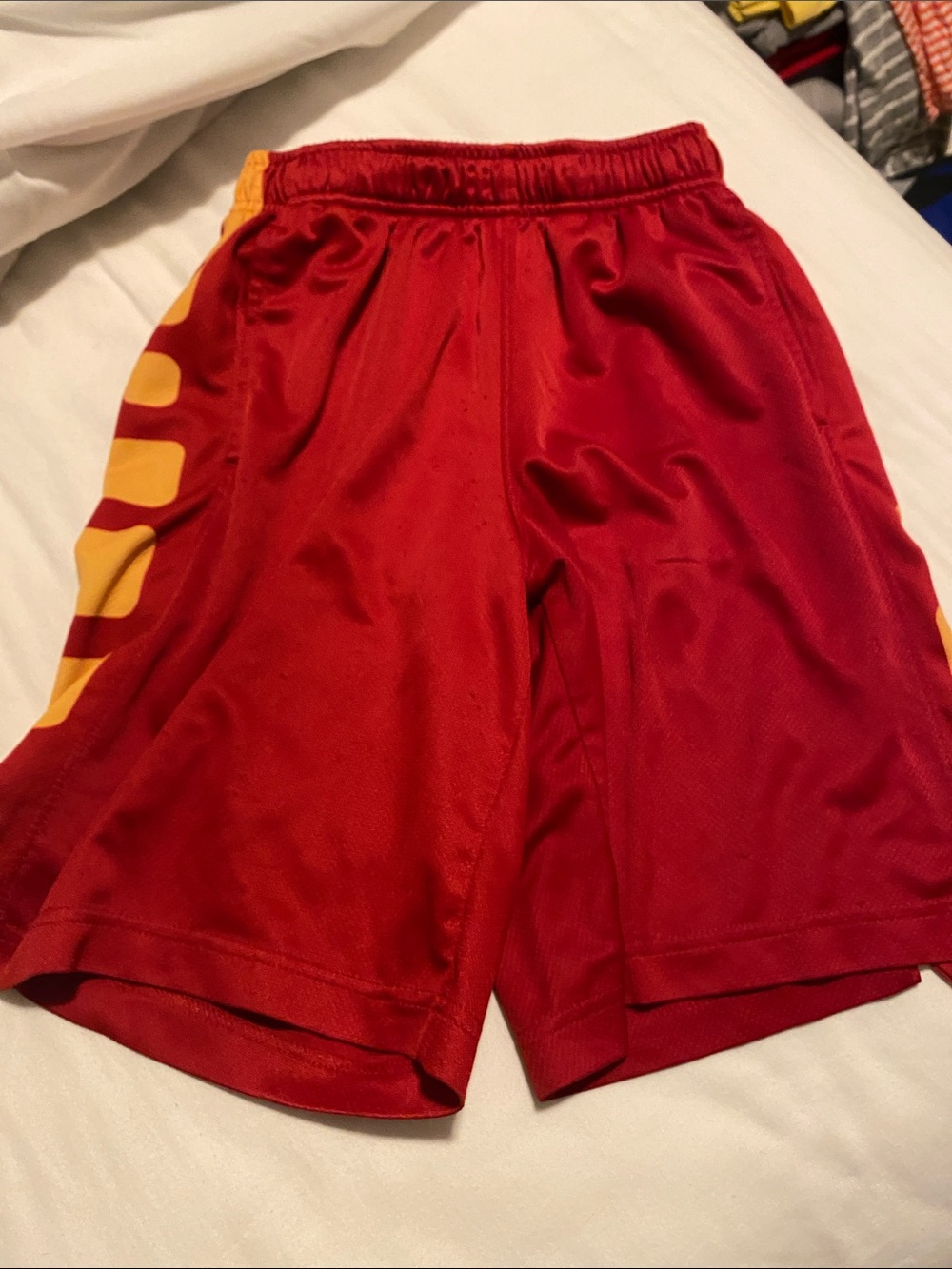 Nike Red Athletic Mesh Shorts with Yellow Side Detail